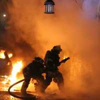 <p>Firefighters braved heavy flames and smoke.</p>