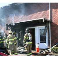 <p>The fire apparently broke out on the first floor of the Spruce Street building in Passaic and instantly spread to the second and an attic shortly before 9:30 a.m. March 3.
  
</p>