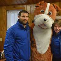 <p>From left,  Paws and Play’s owner Matt Sellechia, mascot Pawley (Andy MacMillan) and Michele MacMillan, manager at Paws and Play.</p>