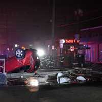 Fleeing Driver Returns After Slamming Into Pole, Rolling SUV In Bergenfield