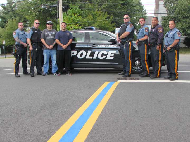 From left: Officers Chris O’Shaughnessy, William Hickey, Brian Rypkema, PBA Local 67 President Luis Vasquez, and Officres Nicholas Snyder, John Rovetto, Juan Rodriguez &amp; Javier Gutierrez.