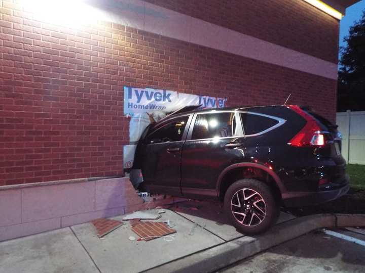 A 54-year-old woman had been drinking when she plowed her Honda SUV through the brick wall of a Hamburg 7-Eleven, police said.