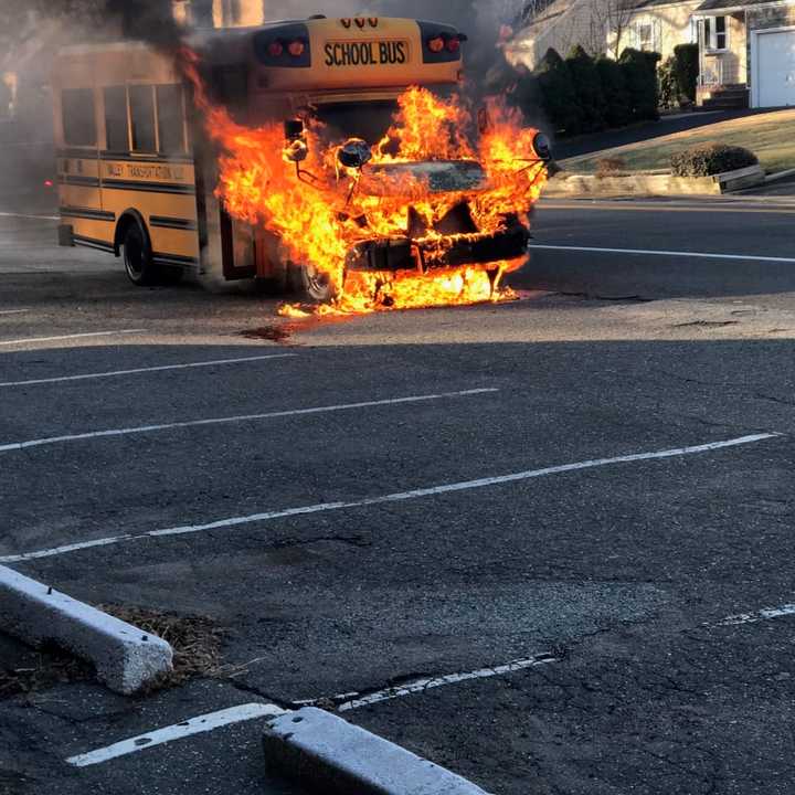 A bus driver got both of his occupants off before it erupted in flames in Cresskill, police said.