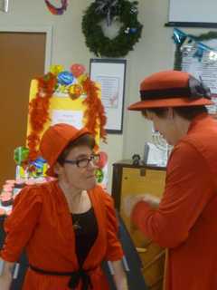 Rockleigh Adult Care Center Inducts Woman Into 'Red Hat Society'