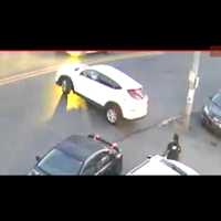 <p>The white SUV the stabbing suspect drove off in while fleeing the scene.</p>