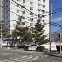 <p>A police cruiser blocks Hillandale Avenue close to Stamford High School on Tuesday afternoon after a bomb threat.</p>