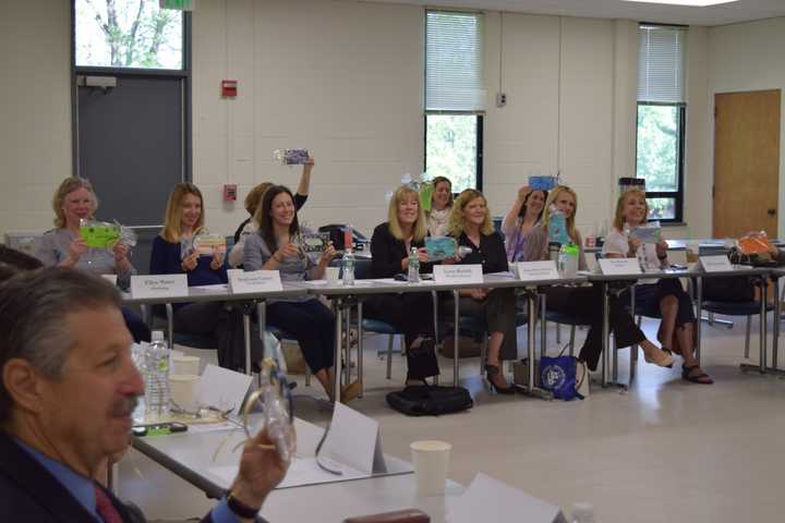 Regional Crisis Team members display inspirational plaques they were given in gratitude at Putnam | Northern Westchester BOCES.