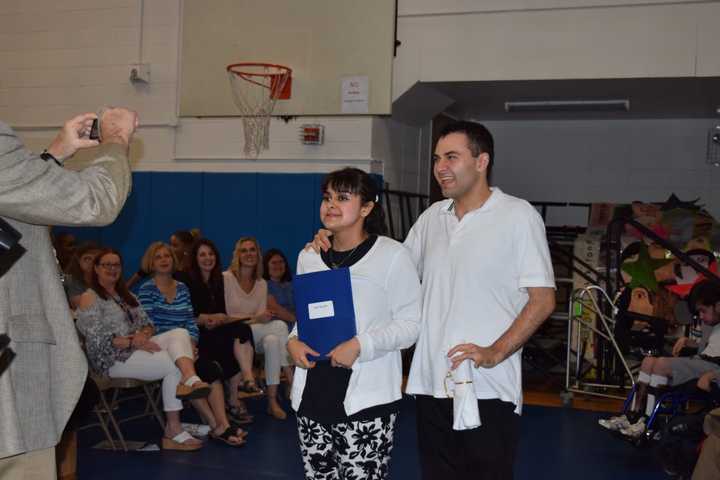 Alexis Aguiar (left) poses with her brother, Casey, at the Pines Bridge and Transitions Graduation at Putnam | Northern Westchester BOCES Friday.