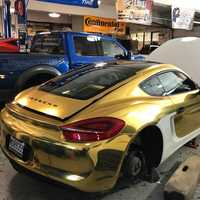 <p>A Porsche gets wrapped at Gold Chrome Car Rentals, LLC in Fort Lee.</p>