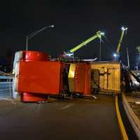 <p>No injuries were reported after a tractor-trailer tipped slightly before 4 a.m. Monday on the Route 46 off-ramp in Ridgefield Park.</p>