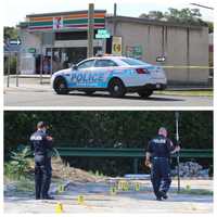 <p>Suffolk County Police investigators surveying the evidence after a 7-Eleven store clerk killed a would-be shoplifter in Melville.</p>