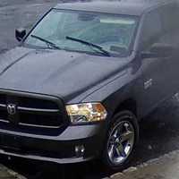 <p>The black vehicle the robber used in the getaway.</p>