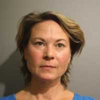Woman Found In Running Car On Side Of Road Under Influence, Police Say