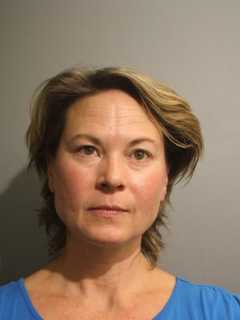 Woman Found In Running Car On Side Of Road Under Influence, Police Say