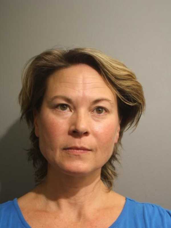 Woman Found In Running Car On Side Of Road Under Influence, Police Say