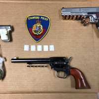 <p>Four men were busted attempting to sell guns with an 18-month-old child in the vehicle.</p>