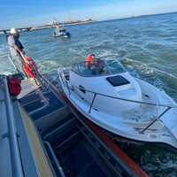 <p>The Coast Guard rescued three adults and a child from a recreational vessel taking on water Sunday at Thimble Shoal South Island, also known as First Island, by the Chesapeake Bay Bridge Tunnel.</p>