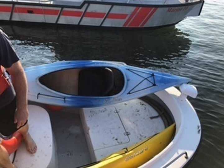 A search of Long Island Sound — after two flares were spotted — turned up two unmanned kayaks off the coast of Madison.