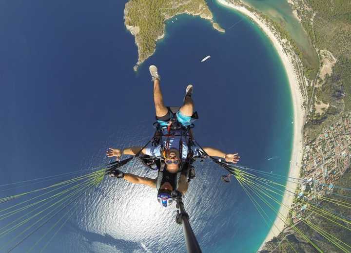 Akil seen here parachuting left an arsenal of breathtaking photos behind.