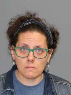 Police: Shelton Woman Assaulted Special Needs Child, Neglected Cat