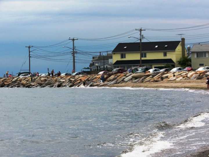 The body was found Monday morning on the beach near the Lordship seawall.