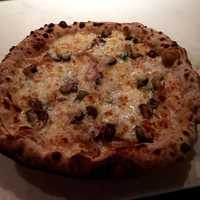 <p>Trevi Ristorante is known for its Roman-style pizzas. Pictured here: Pizza Bosco.</p>