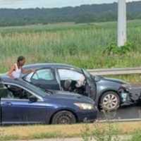 <p>The men leaving the scene of the crash.</p>