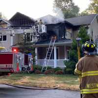 <p>The fire broke out on the second floor of the Hillside Avenue home in Westwood.</p>