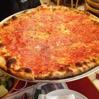 <p>Johnny&#x27;s Pizzeria in Mount Vernon sells pies only; no slices.</p>