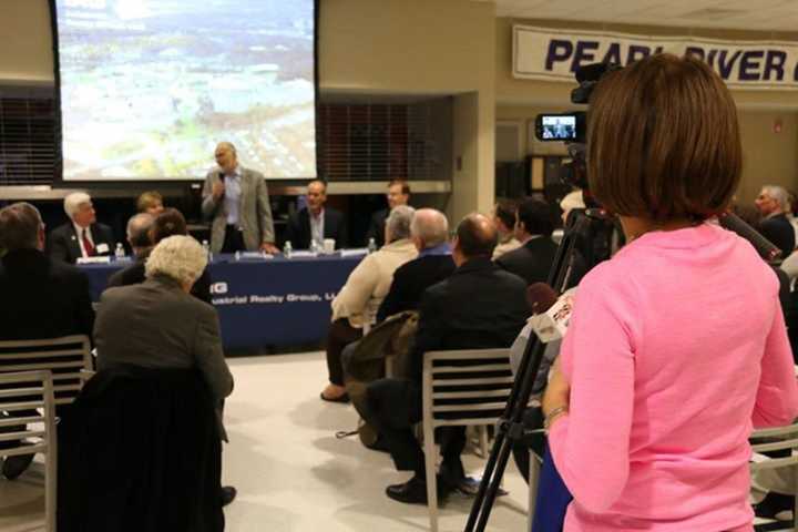 IRG president Stuart Lichter presents plans for what his company envisions for the future of the Pfizer property in Pearl River during a meeting on Tuesday.