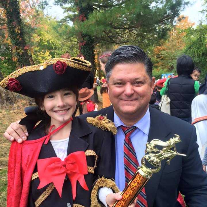 Councilman Carlos Rendo hangs out with a young pirate at a Halloween party in Woodcliff Lake.