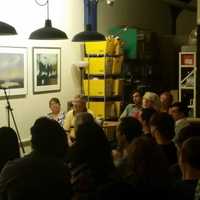 <p>A recent Pros(e) of Pie open mic event.</p>