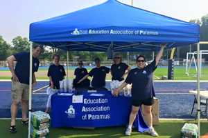 Paramus Teachers, Police Officers Swing Bats For Children's Health Fund
