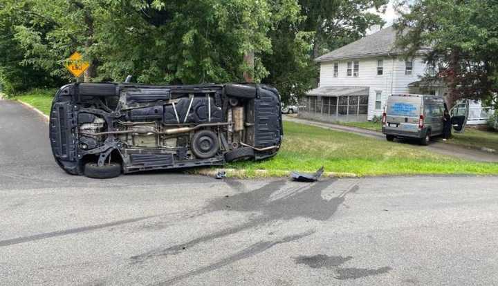 The driver of a van in Rockland County overturned after being involved in a two-car crash, police said.