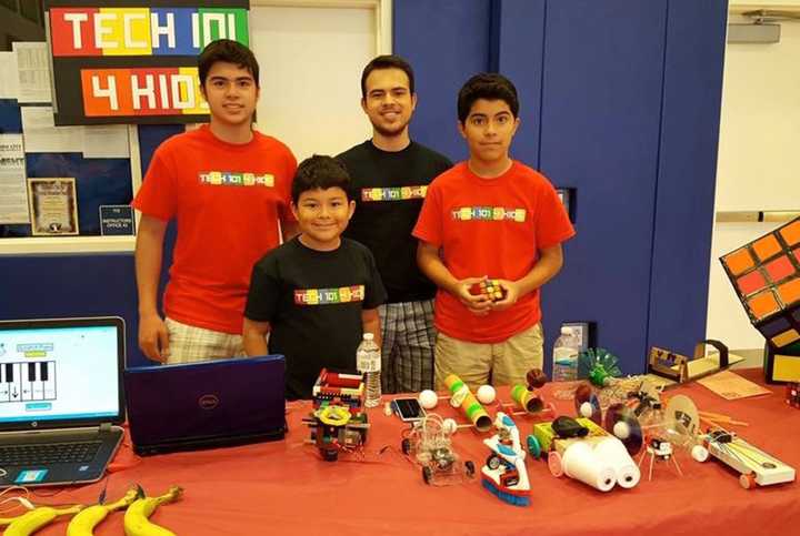 The Pinos family with some of the tools they use to teach others.