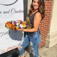 <p>Dylan Elias, 23, is opening the storefront for her new charcuterie board business, PlatedByD, on Nov. 1 in Lodi.</p>