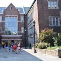 <p>Students walking into the first day of school in Bronxville.</p>