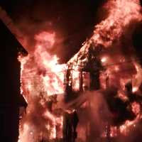 <p>Flames consumed the first home and ravaged the second.</p>