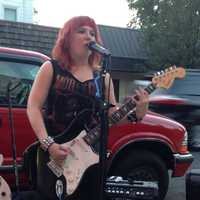 <p>Mary O&#x27;Neill of River Vale performs with Lunatic Fringe outside of Rony&#x27;s Rockin&#x27; Grill in Bergenfield.</p>