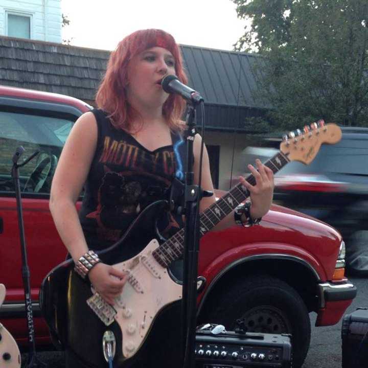 Mary O&#x27;Neill of River Vale performs with Lunatic Fringe outside of Rony&#x27;s Rockin&#x27; Grill in Bergenfield.