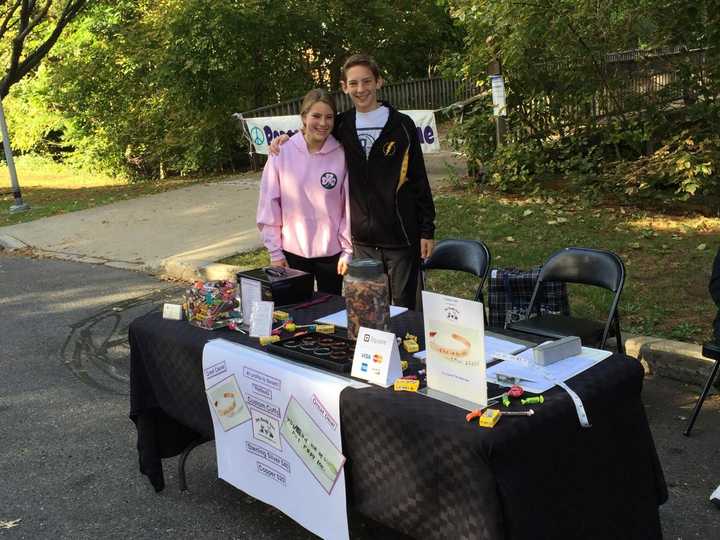 Georgia and Daniel Danzger sell bracelets to benefit PetResQ in Tenafly.