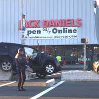 <p>The Jeep ended up on the median after colliding with the sedan (left) on Broadway at 30th Street in Fair Lawn.</p>