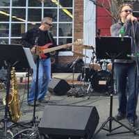 <p>Rich Leonarz, second from right, feels the beat with DNB outside of The Office last weekend.</p>