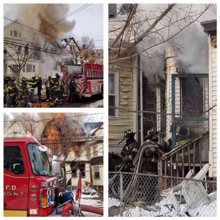 Approximately 90 Newark firefighters worked to knock down the South 11th Street house fire, which sent a teen boy to the hospital and displaced a family of five, authorities said.