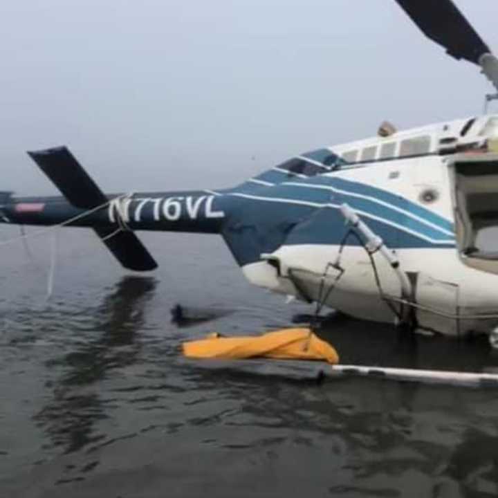 A helicopter made an emergency landing after on Long Island Sound after encountering bad weather.