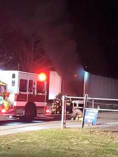 Trumbull Firefighters Extinguish Smoking Tractor Trailer