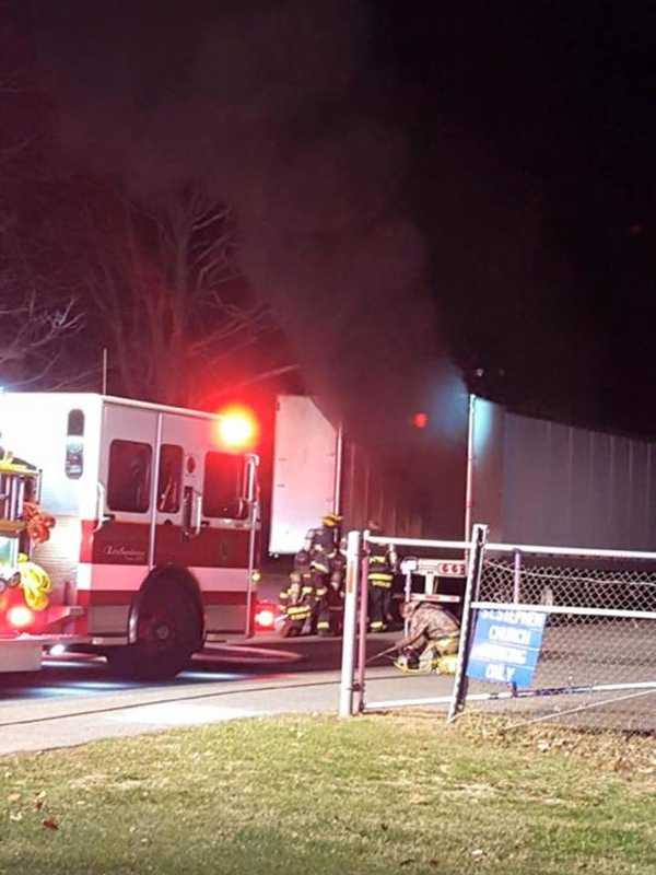 Trumbull Firefighters Extinguish Smoking Tractor Trailer