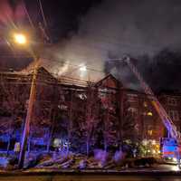 <p>The fire continues to burn into the early evening in a condo building on Richards Avenue in Norwalk.</p>