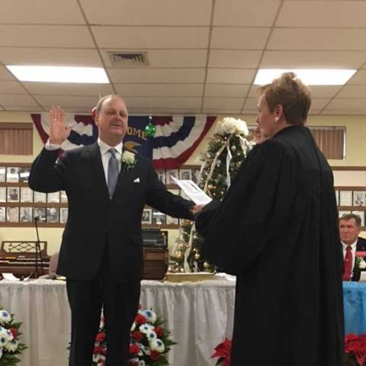 Mark Tomko being sworn in as mayor at the Wallington reorganization meeting.