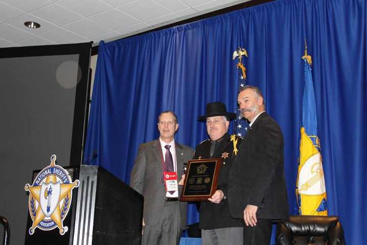 From left, National Sheriff’s Association Executive Director Jonathan F. Thompson, Orange County Sheriff Carl E. DuBois and National Sheriff’s Association President Sheriff Danny L. Glick, Laramie County, Wyoming.